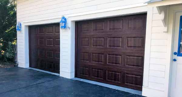 Two-car Garage with blue outside lamps Athens, GA