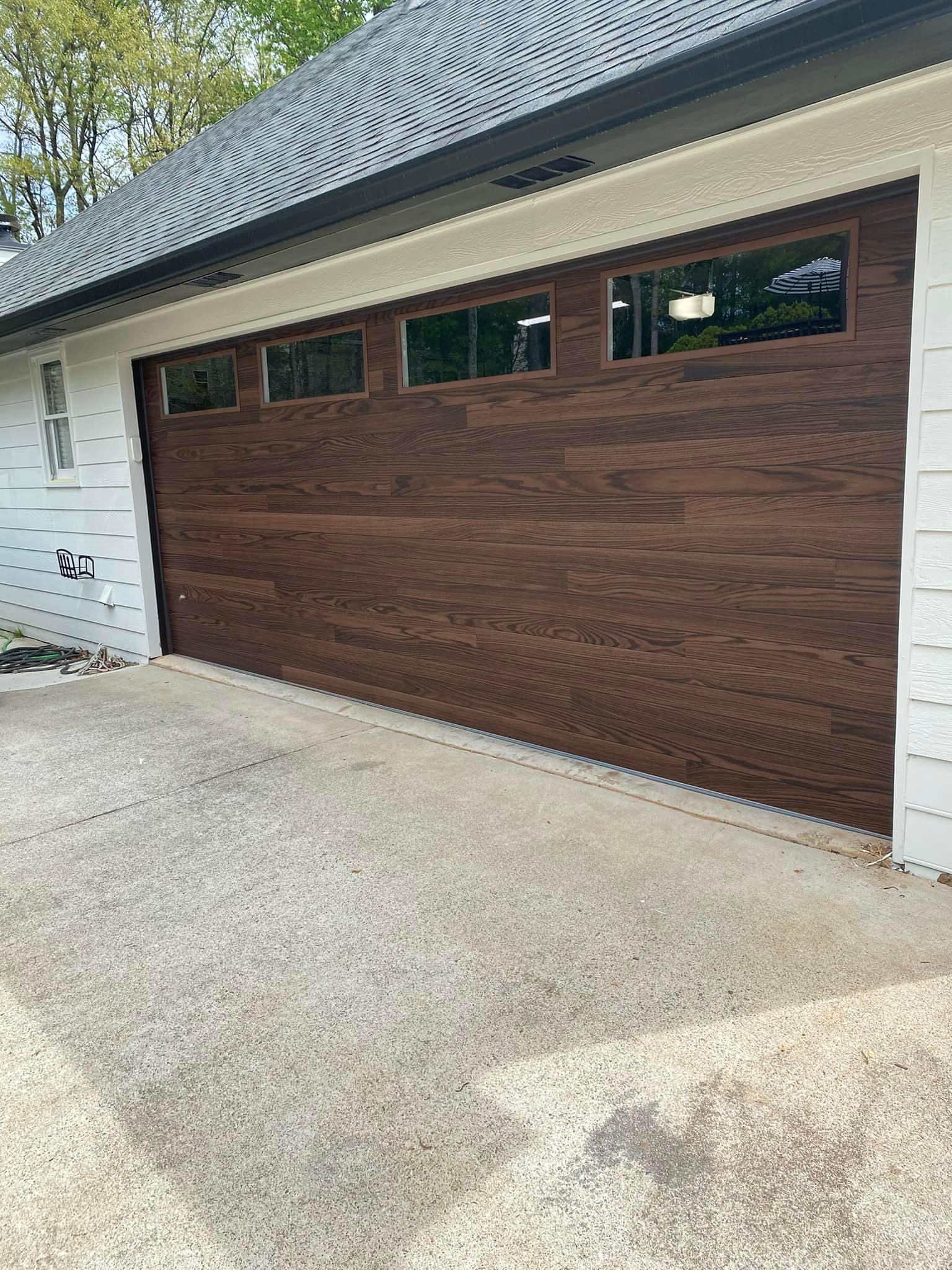 A newly installed garage door in Lawrenceville Ga